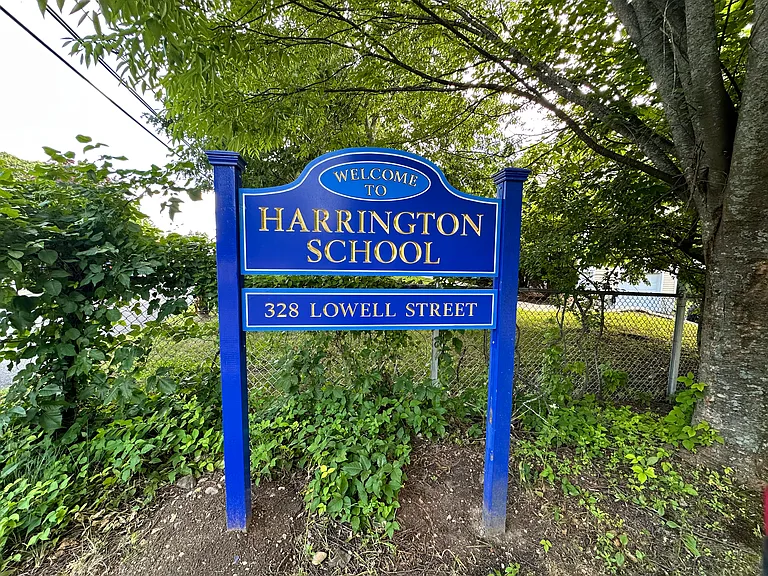 This property sits adjacent to Harrington Elementary with garage/driveway entrance on one way street leading to the school. Schedule your tour today!