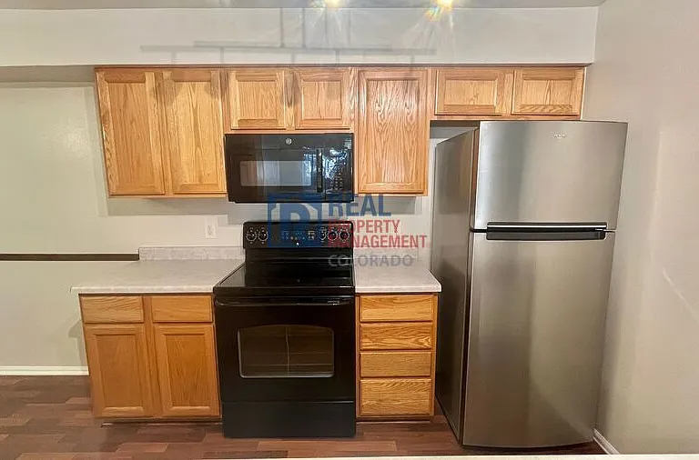10784 W 63rd Pl #103 — Photo 7