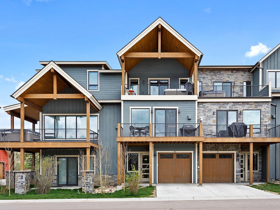 Front of townhome - middle unit with covered patio.