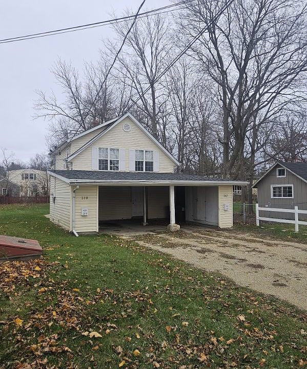 covered parking on left side - shared driveway