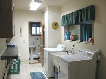 Lots of storage in 1st floor utility room