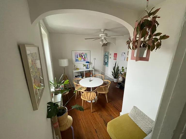 Photo from 2024 View from kitchen into sitting area/dining room.