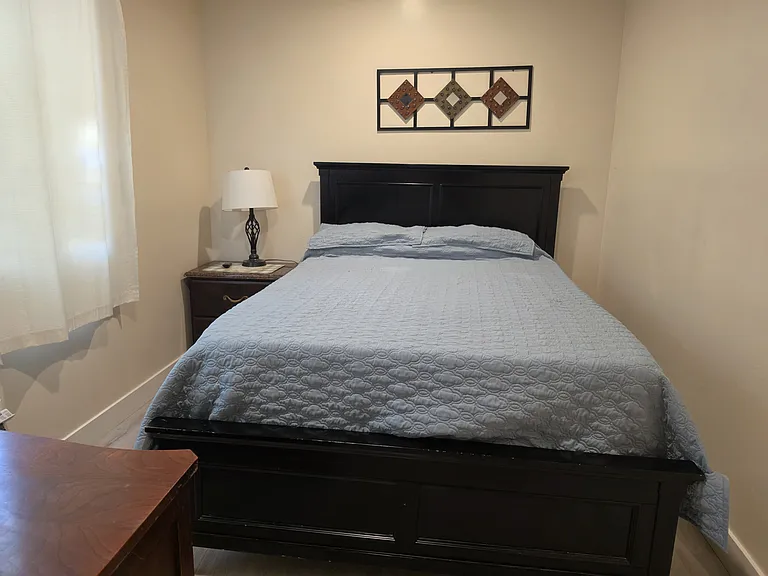 3rd bedroom with closet and ceiling fan.