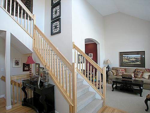 Grand entry with vaulted ceilings