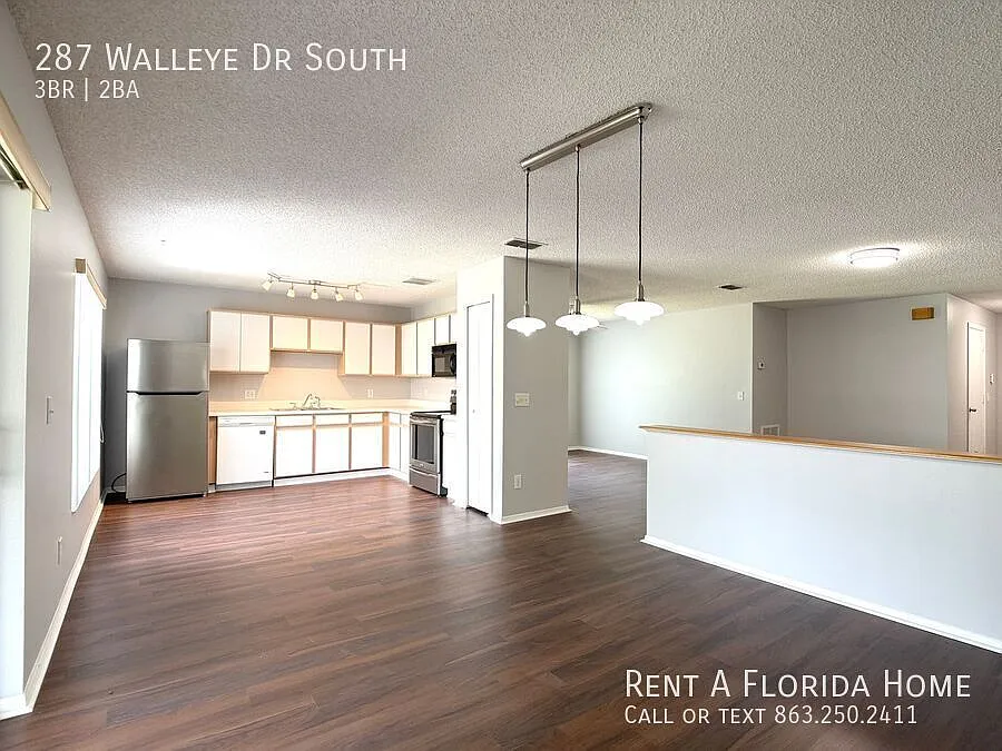 Move-In Ready! New Interior Paint! New Laminate Flooring! New Bathroom Tile! Lawn Care & Pest Con... — Photo 2