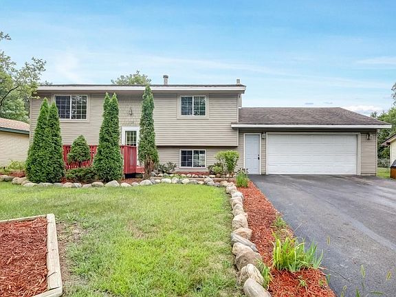 Low maintenance siding, large attached garage