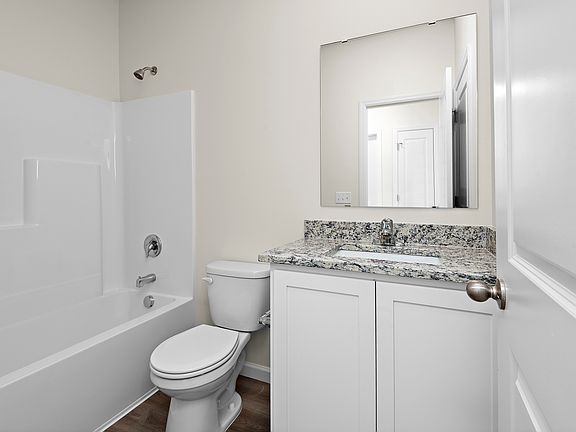 The bath is a tub shower combo.