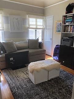 Living room - prior tenant configuration.