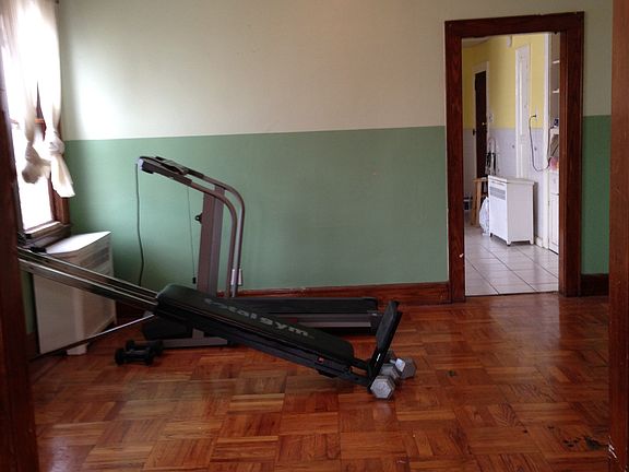Dining room w/ entrance to Kitchen