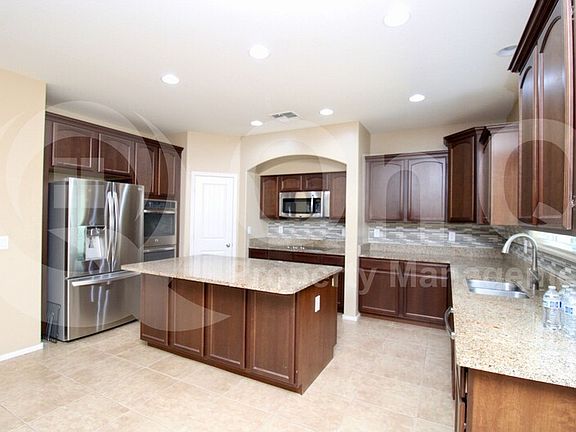4th image of 9576 W Harmony Ln