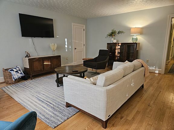 The living room is spacious and bright.
