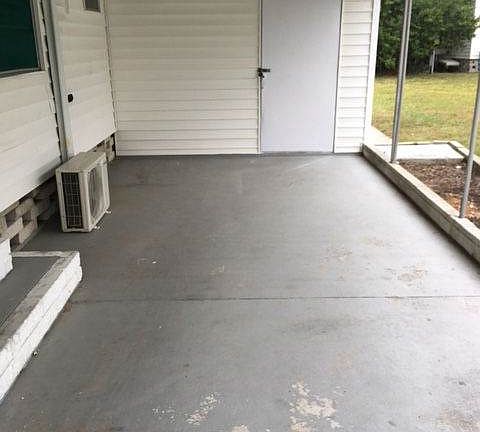 Carport with shed
