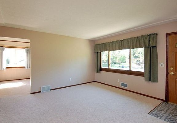 Living room opens to kitchen