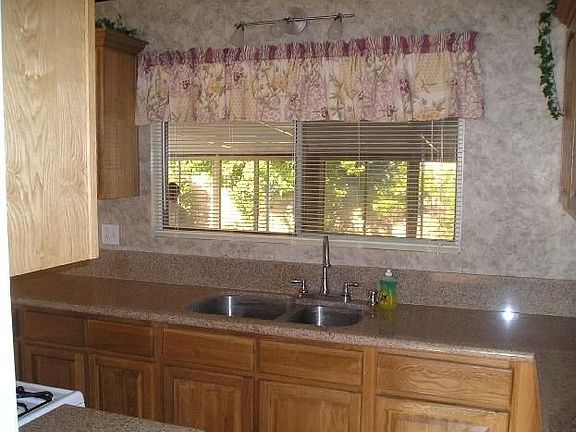 new kitchen w/ granite - new floor - new stove 