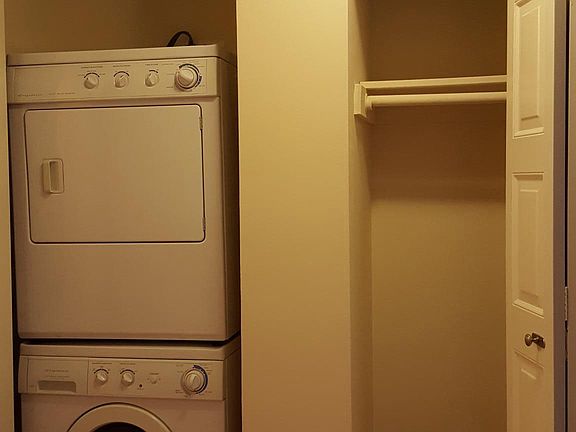 Foyer Facing Laundry Closet and Closet