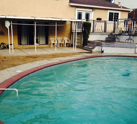 HUGE backyard with pool