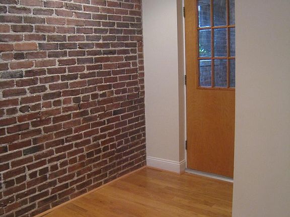 Entry area with exposed brick