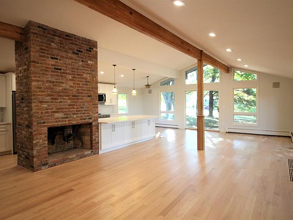 House # 1 - Vaulted, bright Living Room with gas fireplace.