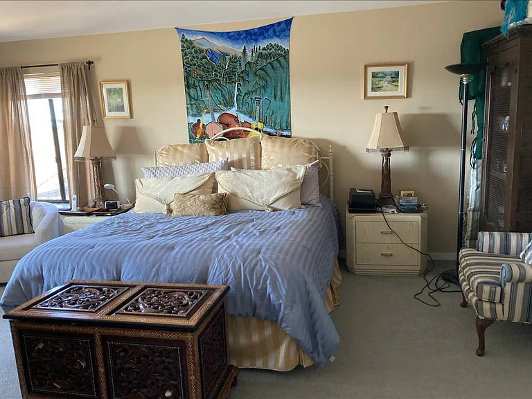 Master bedroom with deck and large bathroom suite for two