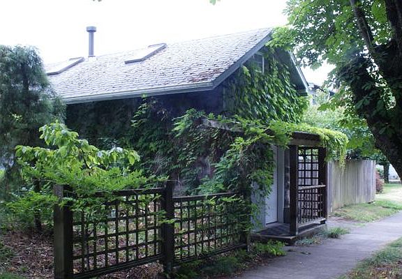 Your very own Tiny House with two lofts and gorgeous woodwork including hardwood floors!