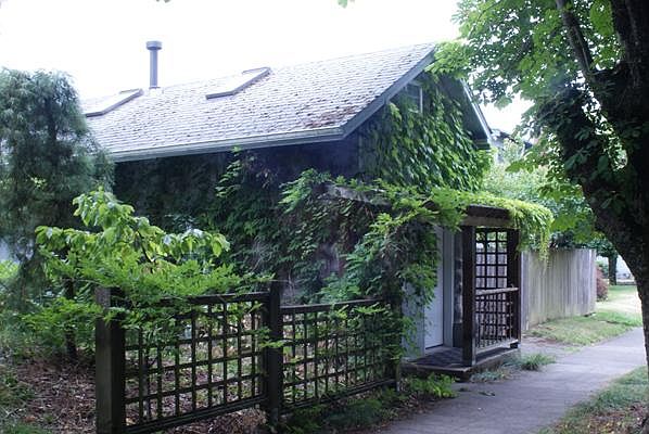 Your very own Tiny House with two lofts and gorgeous woodwork including hardwood floors!