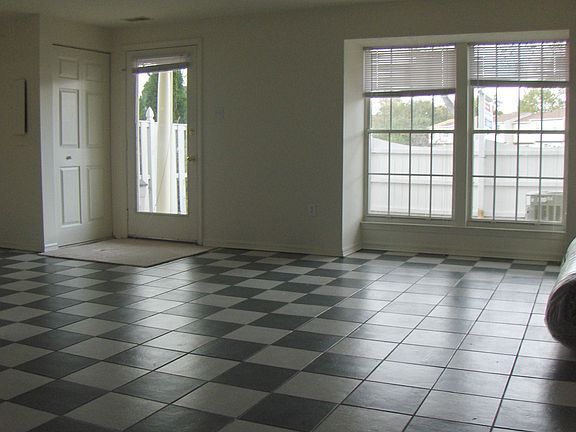 lower level- now carpet and harwoods (tile under)