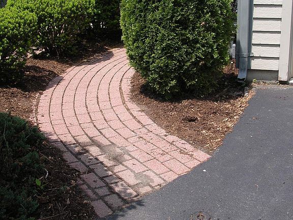 brick walkway to door