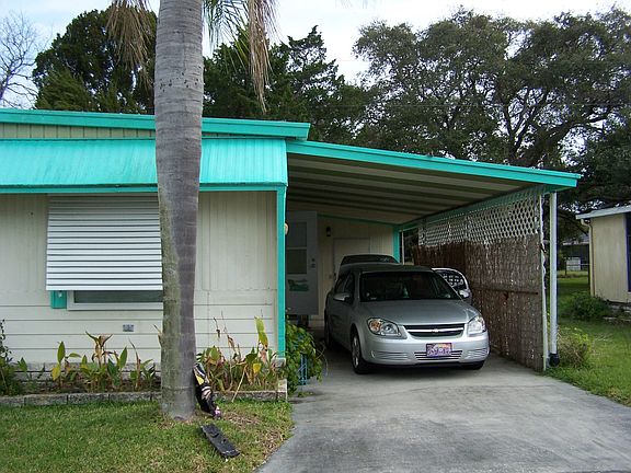 Carport Holds 2 Cars or Pati