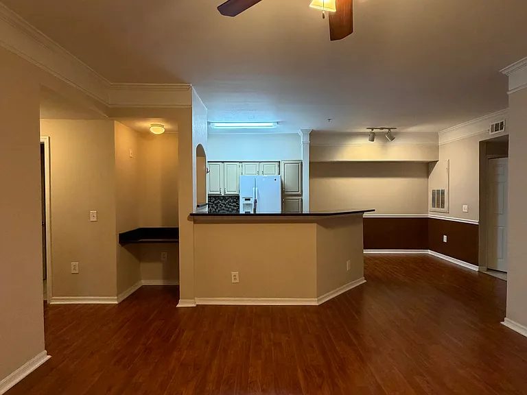 Bright kitchen with a great view of the living room.