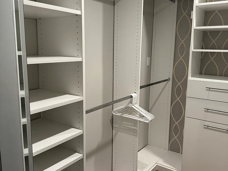 Primary Bedroom walk-in closet