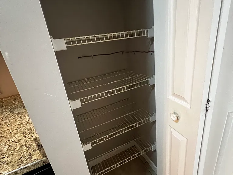 Pantry located in the kitchen