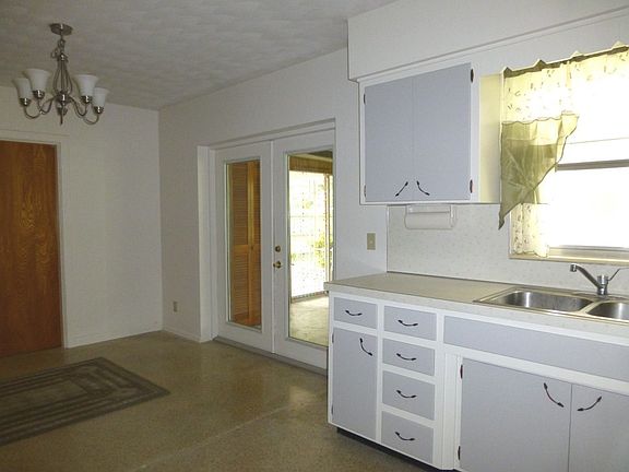 Retro kitchen view 2 with L shaped dining area