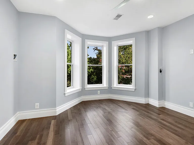 street side master bedroom with historic windows replaced with Ultra Marvin double-pane tilt windows
