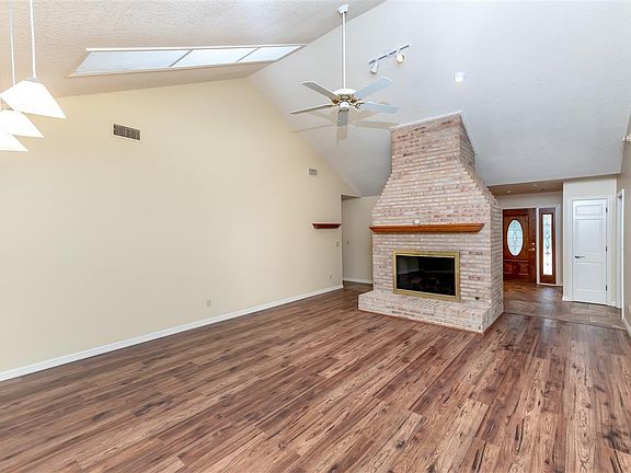 Living Room Overlooks Pool and Entertainment area.