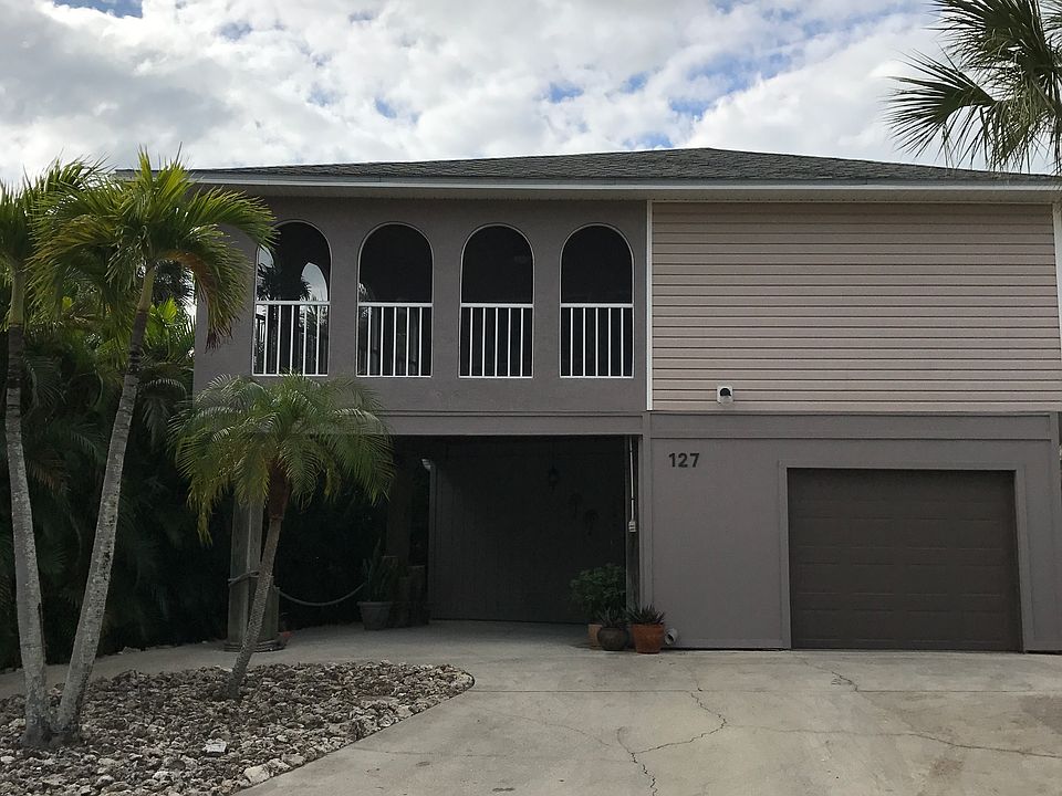 Front View Steps From Beach!