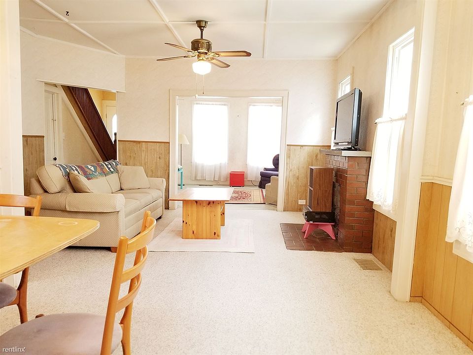 dining for 6, living and sitting rooms. second floor stairca