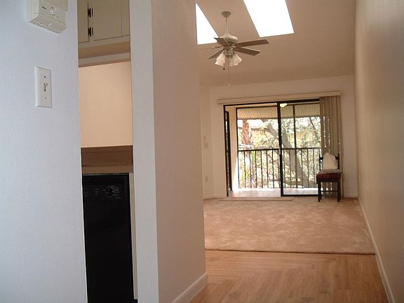 View coming up stairs to living area