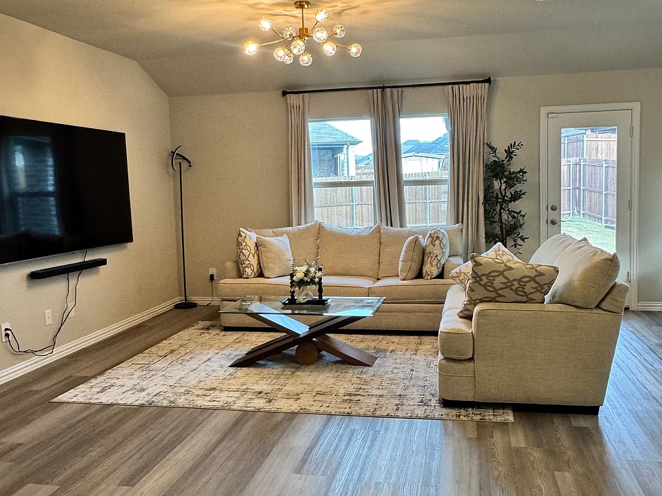 New luxury vinyl flooring in spacious open concept livikng area.