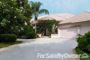 Front of Home
						:
						Small side driveway 1 car, large driveway 4 cars, 3 Magnolias
shade West side.