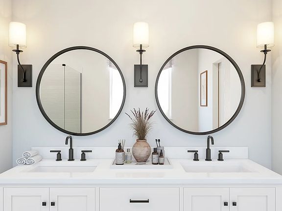 Primary bath with circular mirrors