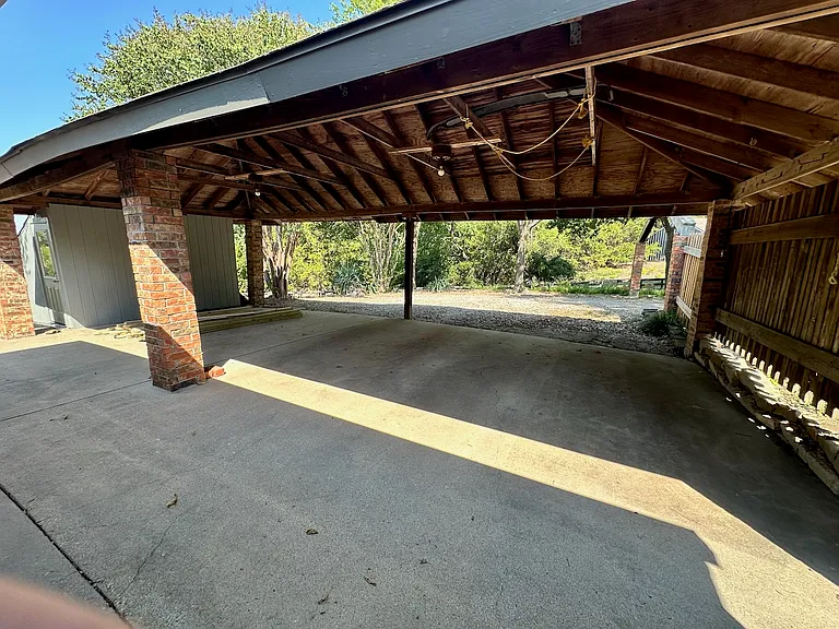 Covered car port. Room for four vehicles.