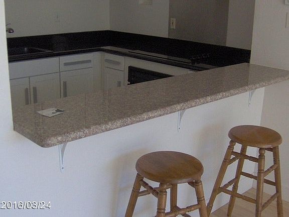 from living looking into kitchen