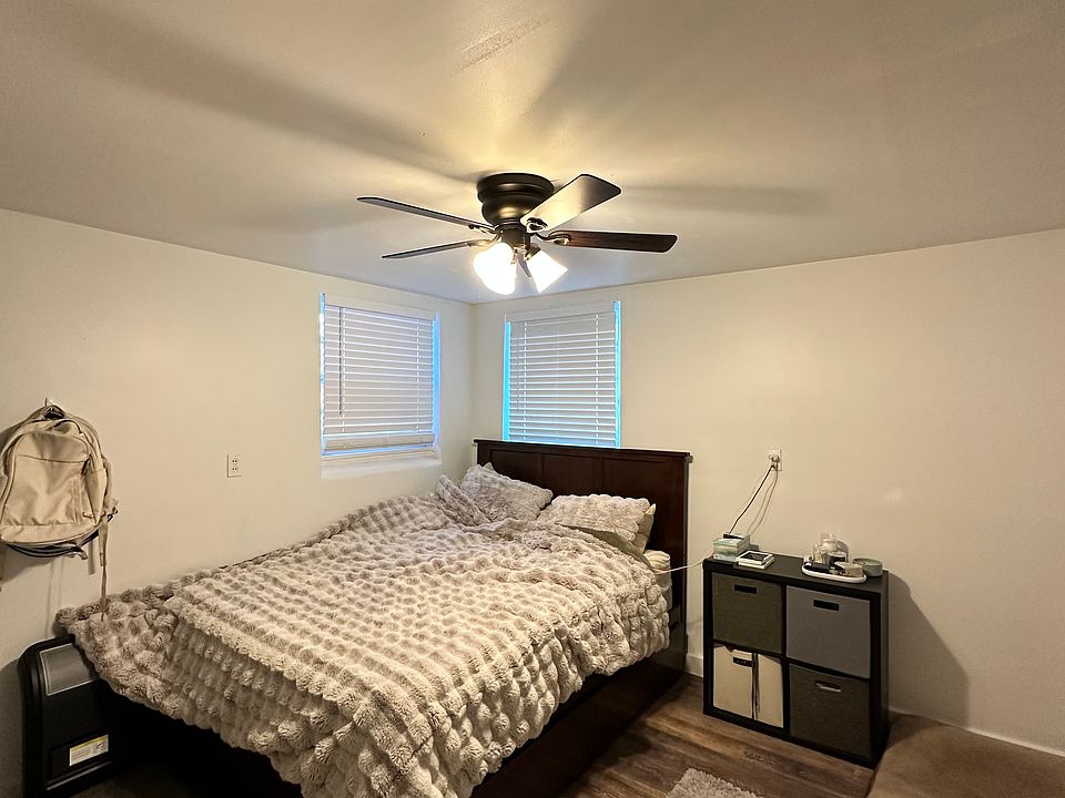 Bedroom w ceiling fan, new paint, blinds. Approx 12x12