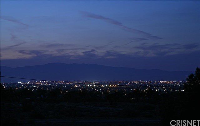 Million dollar valley, sunset and city lights view.