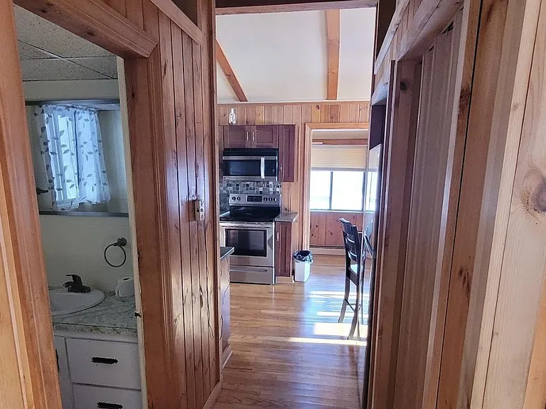 Half bath of the kitchen on the left refrigerator pantry on the right