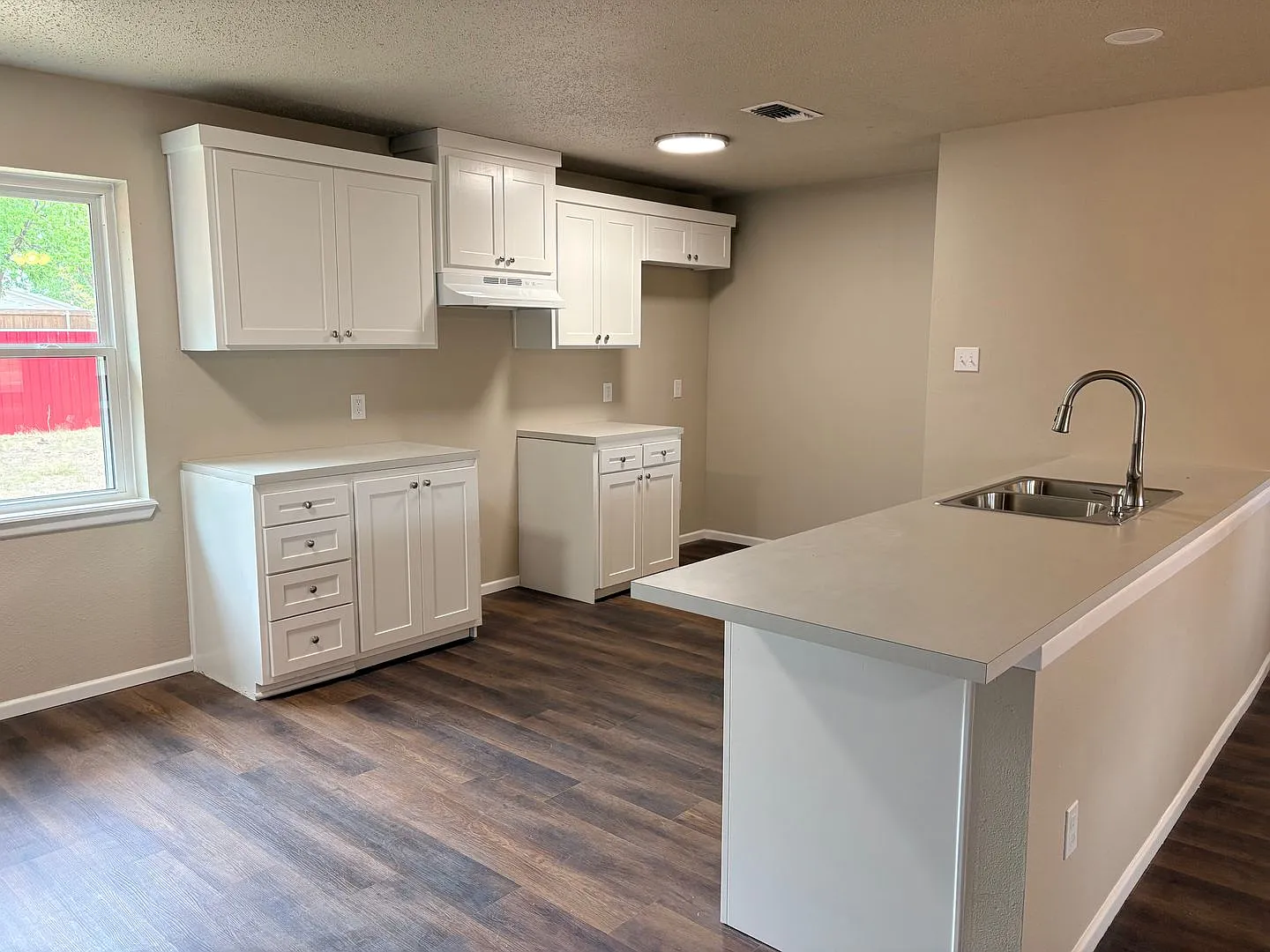 $999.00 First Month Rent Remodeled 4 Bed 2 Bath by West End Center — Photo 2