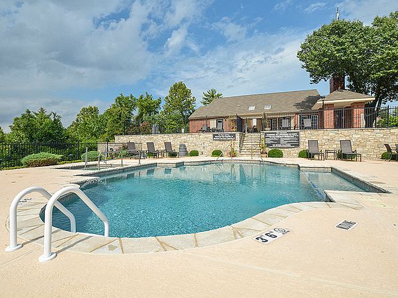 Relax by the Outdoor Pool and Hot Tub at the Clubhouse