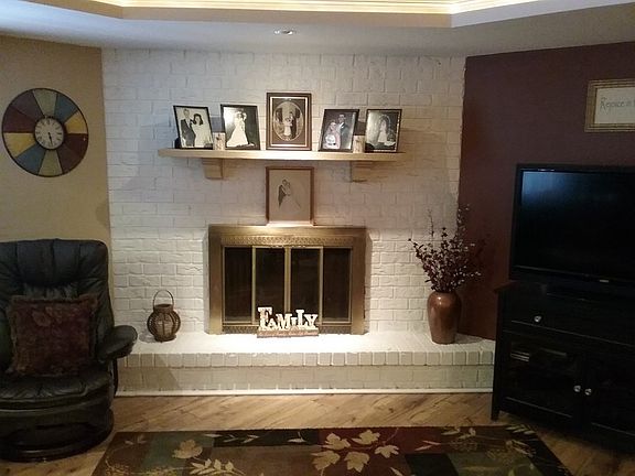 Family room with TV and fireplace
