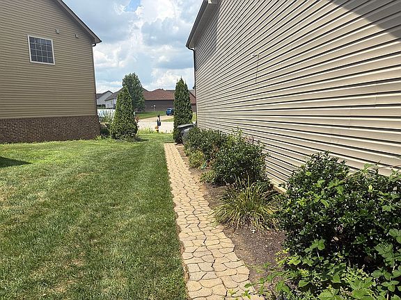 Walk to front of house