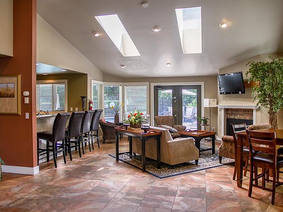 Club house features its own kitchen, TV, and gas fireplace. Host private events or parties, or just chill!